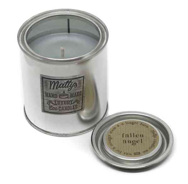 A silver candle container labeled "Matty's Hand Made Luxury Eco Candles" with the lid removed reveals a gray candle with an unlit wick. The lid's label reads "Fallen Angel Candle, stronger scent & a longer burn.