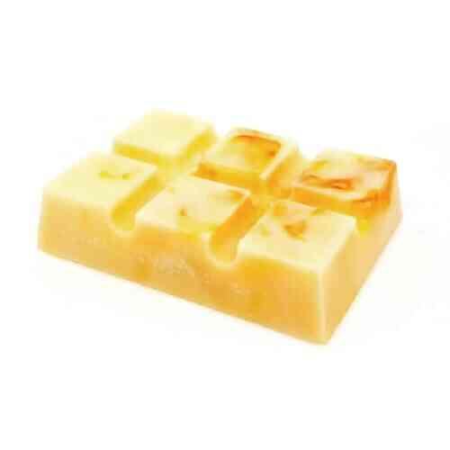 A rectangular block of soap with a light yellow color and a marbled texture, reminiscent of clementine hues. The Champers & Clementine Snap Bar is divided into six thick segments and has a smooth surface, making each use feel luxurious.