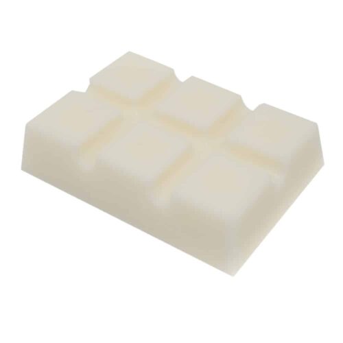 A bar of white chocolate with a smooth, glossy surface, featuring six segmented squares on top. The Kreed Snap Bar is slightly tilted, showing its thickness and the individual sections clearly. The background is plain white.
